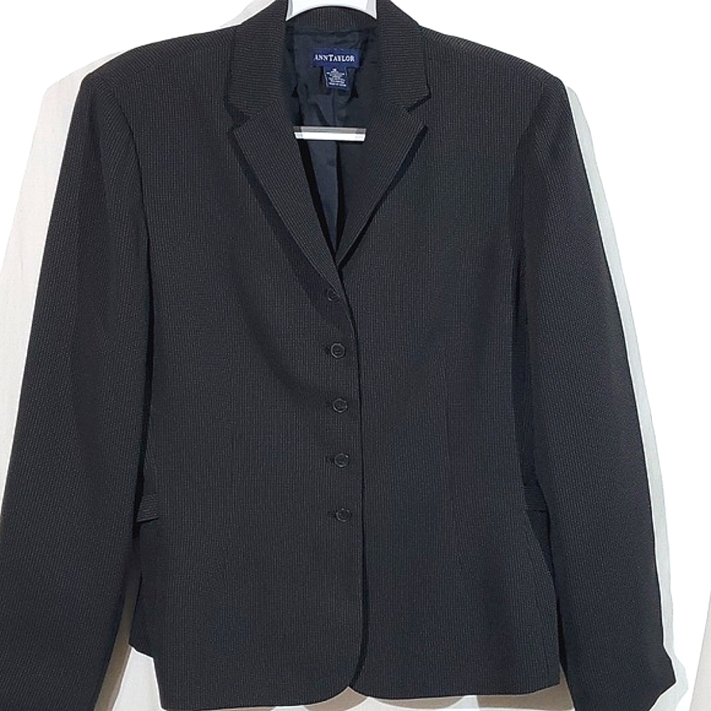 Ladies suit, jacket and slacks.